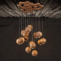 Sylva Chandelier With Orb Of Solid Wood For Modern Living Rooms